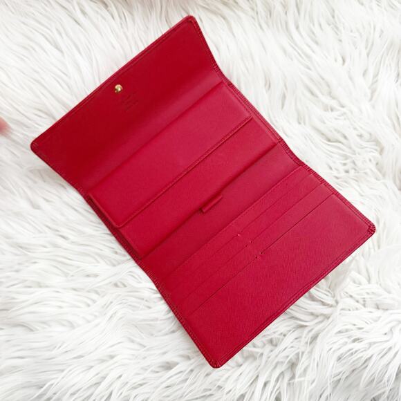 LOUIS VUITTON | Epi Leather Porte Trésor International Wallet Red Textured - Picture 6 of 13